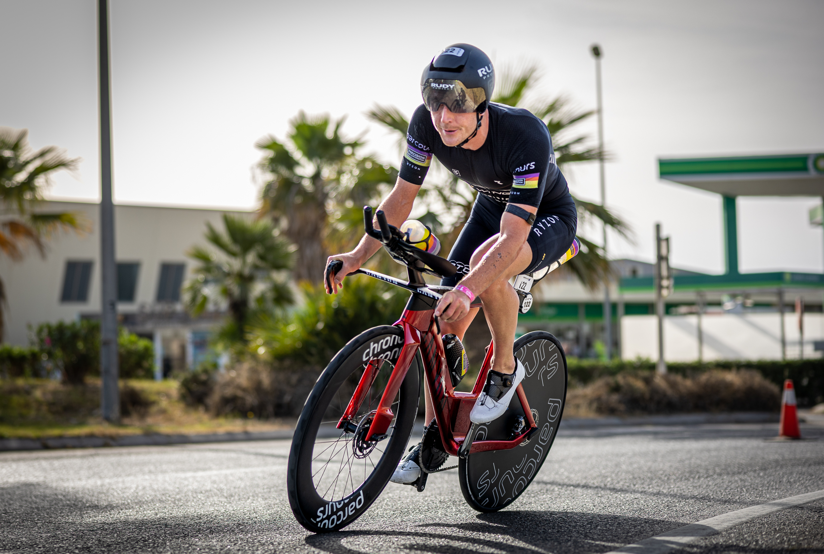 Kyle Smith riding a triathlon bike with Classified Powershift Technology